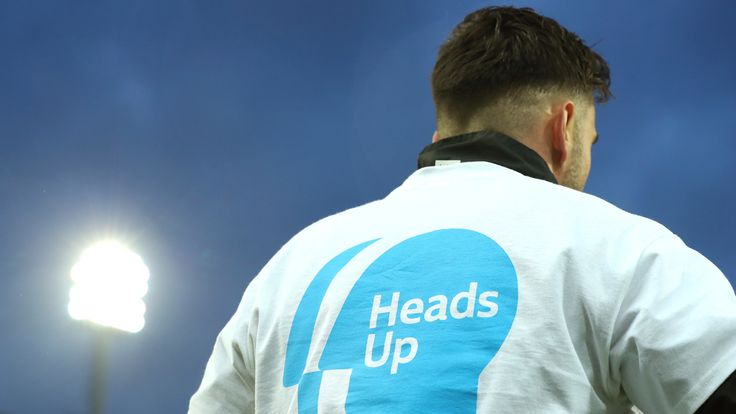 A detailed view of the Heads Up branding is seen on the Norwich City warm up shirts prior to the Premier League match between Norwich City and Liverpool FC at Carrow Road on February 15, 2020
