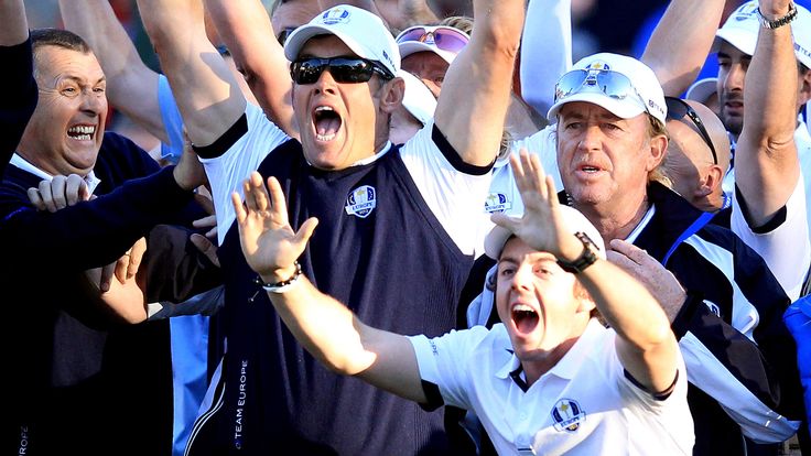 Lee Westwood and Rory McIlroy of Europe celebrate after watching Martin Kaymer of Europe hole the putt that retained the Ryder Cup on the the 18th green during the Singles Matches for The 39th Ryder Cup at Medinah Country Club on September 30, 2012 in Medinah, Illinois.