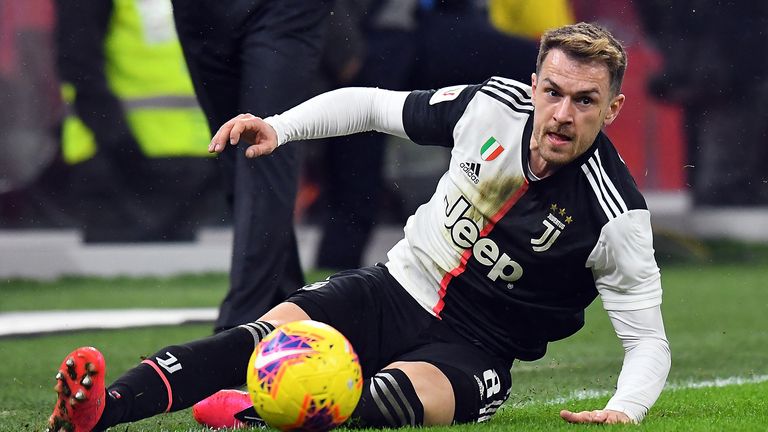 Aaron Ramsey of Juventus in action during the Coppa Italia Semi Final match between AC Milan and Juventus at Stadio Giuseppe Meazza on February 13, 2020 in Milan, Italy.