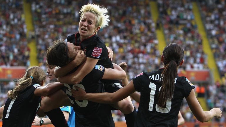 Abby Wambach celebrates with Megan Rapinoe after the two players combined to equalise for the USA against Brazil in the 2011 World Cup quarter-final in Dresden