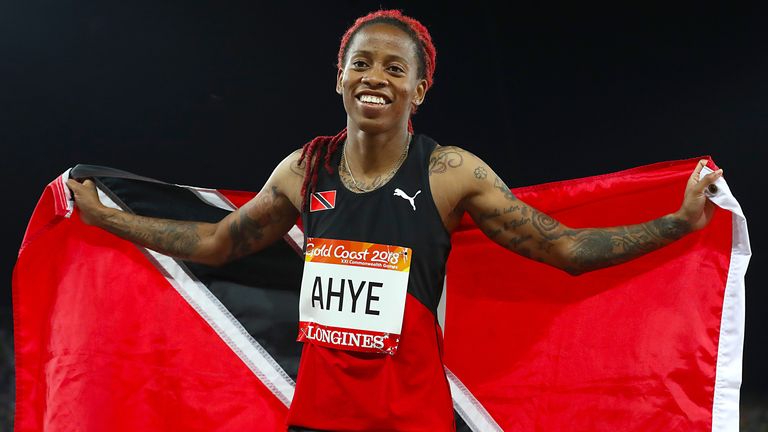 Trinidad and Tobago's Michelle-Lee Ahye celebrates after winning gold in the Women's 100m Final at the Carrara Stadium during day five of the 2018 Commonwealth Games in the Gold Coast, Australia. PRESS ASSOCIATION Photo. Picture date: Monday April 9, 2018. See PA story COMMONWEALTH Athletics. Photo credit should read: Martin Rickett/PA Wire. RESTRICTIONS: Editorial use only. No commercial use. No video emulation.