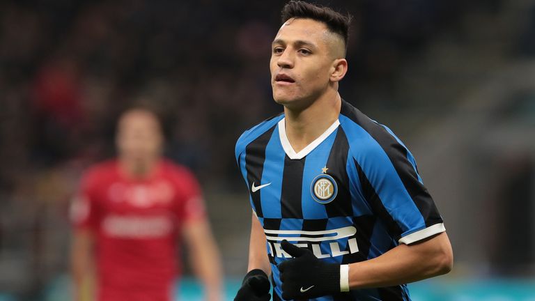 Alexis Sanchez in action during the Coppa Italia quarter-final match between Inter and Fiorentina