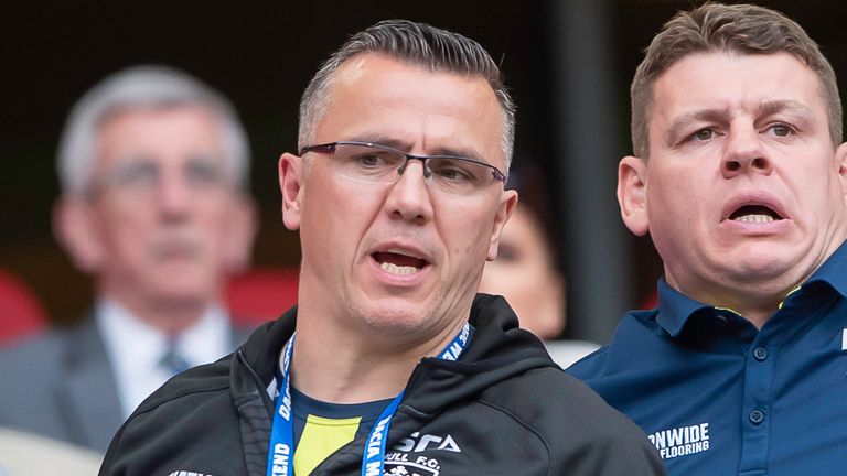 Picture by Allan McKenzie/SWpix.com - 25/05/2019 - Rugby League - Dacia Magic Weekend 2019 - Hull FC v Huddersfield Giants - Anfield, Liverpool, England - Hull FC coach Lee Radford (r) dejected after his side's heavy 55-2 defeat to Huddersfield.