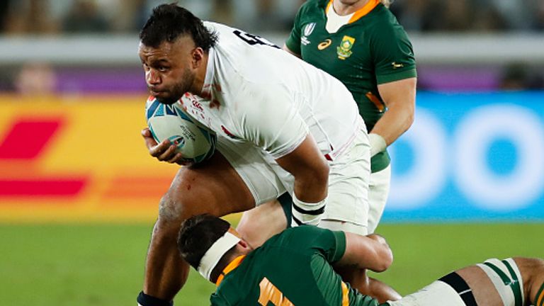 England's number 8 Billy Vunipola (L) is tackled by South Africa's back row Francois Louw during the Japan 2019 Rugby World Cup final match between England and South Africa at the International Stadium Yokohama in Yokohama on November 2, 2019. (Photo by Odd Andersen / AFP) (Photo by ODD ANDERSEN/AFP via Getty Images)