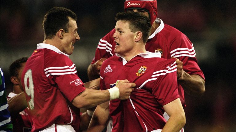 Try-scorer Brian O&#39;&#39;Driscoll of British Lions is congratulated by team mate Rob Howley (left) during the Australia v British Lions match as part of the Lions Tour to Australia, played at the Gabba Stadium in Brisbane, Australia. Lions beatAustralia 29 - 13. \ M