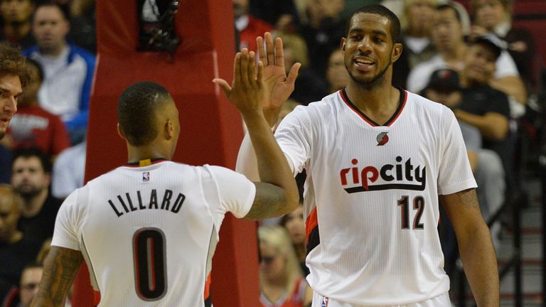 Aldridge in action with Damian Lillard for the Portland Trail Blazers