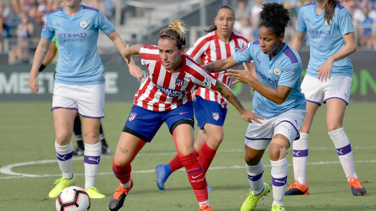 Angela Sosa #7 of Atletico de Madrid is defended by Demi Stokes #3 of Manchester City 
