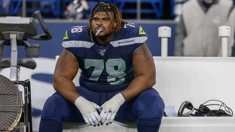 Offensive tackle D.J. Fluker #78 of the Seattle Seahawks sits on the bench after losing to the San Francisco 49ers 26-21 at CenturyLink Field on December 29, 2019 in Seattle, Washington. 