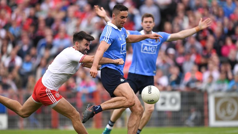 James McCarthy of Dublin goes past Tiernan McCann of Tyrone on his way to score his side's goal