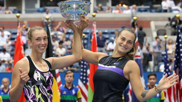Elise Mertens (L) of Belgium and Aryna Sabalenka of Belarus pose with the trophy after winning their Women's Double's final match against Victoria Azarenka of Belarus and Ashleigh Barty of Australia on day fourteen of the 2019 US Open at the USTA Billie Jean King National Tennis Center on September 08, 2019 in the Queens borough of New York City.