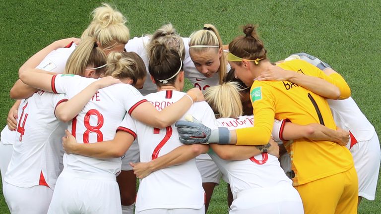 England's players huddle prior to the France 2019 Women's World Cup Group D football match between England and Scotland, on June 9, 2019, at the Nice Stadium in Nice, southeastern France.