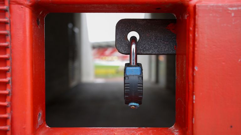 A view of locked gates at a football stadium 