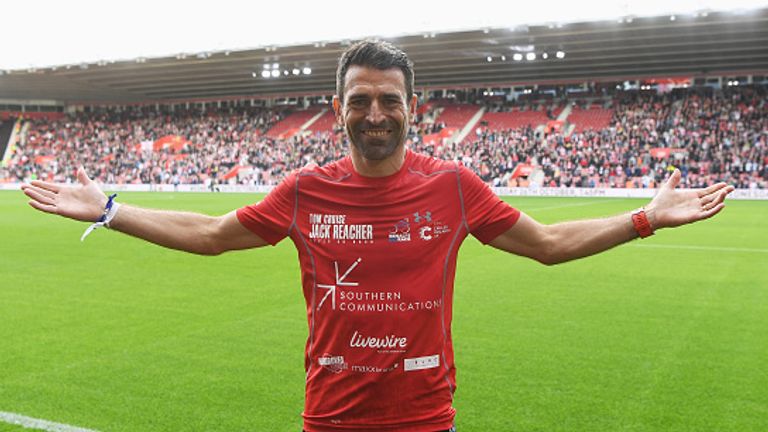 SOUTHAMPTON, ENGLAND - OCTOBER 16:  Former Southampton player and charity fundraiser Francis Benali salutes the crowd as he finishes his groundhopping endurance challenge during the Premier League match between Southampton and Burnley at St Mary's Stadium on October 16, 2016 in Southampton, England. Benali's Big Race is raising money for Cancer Research.  (Photo by Mike Hewitt/Getty Images)