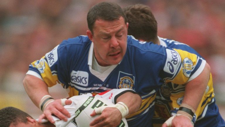 29 APR 1995: JASON ROBINSON OF WIGAN IS BROUGHT DOWN BY GARRY SCHOFIELD OF LEEDS DURING THE RUGBY LEAGUE CHALLENGE CUP FINAL AT WEMBLEY. WIGAN WON THE MATCH 30-10. Mandatory Credit: Chris Cole/ALLSPORT