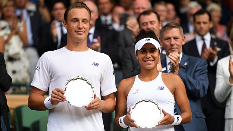 LONDON, ENGLAND - JULY 16:  Runners-up Heather Watson of Great Britain and Henri Kontinen of Finland pose with their trophies after the Mixed Doubles final match against Jamie Murray of Great Britain and Martina Hingis of Switzerland on day thirteen of the Wimbledon Lawn Tennis Championships at the All England Lawn Tennis and Croquet Club at Wimbledon on July 16, 2017 in London, England.  (Photo by David Ramos/Getty Images)