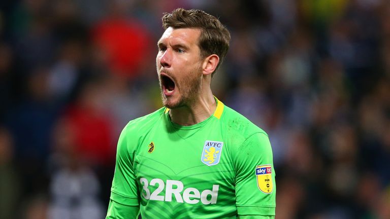 Jed Steer celebrates his first of two penalty saves in Aston Villa's play-off semi-final shootout against West Brom 