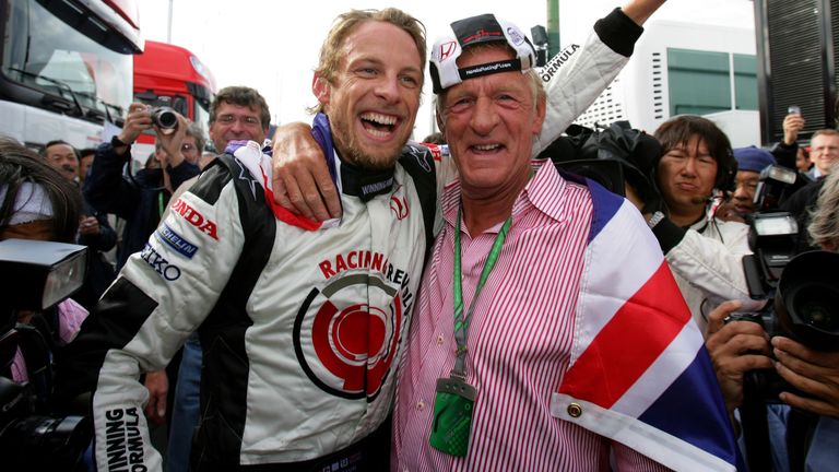 Jenson and John Button celebrate the moment they had long been waiting for