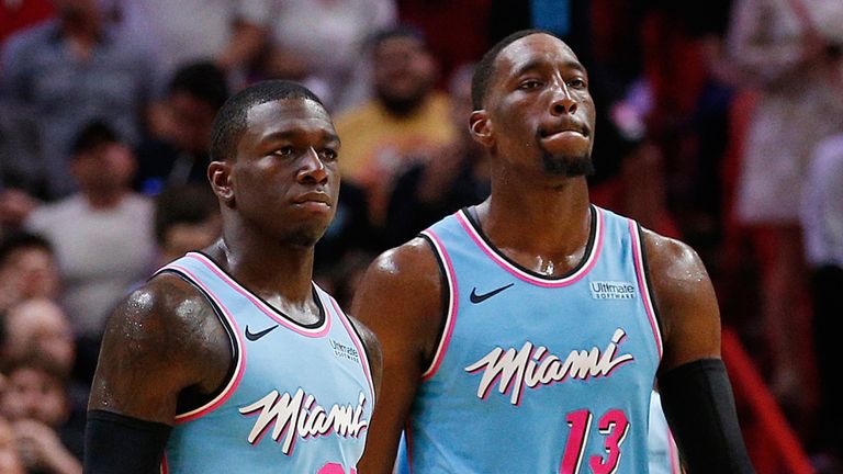 Kendrick Nunn and Bam Adebayo walk off court after a Miami Heat win