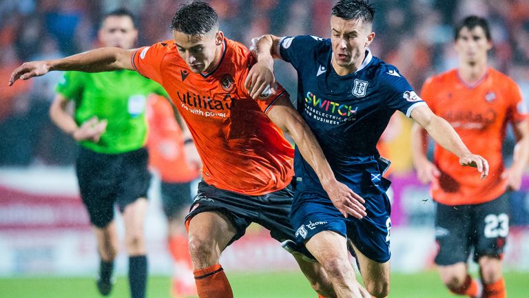 Lewis Appere (left) of Dundee United in action against Cammy Kerr of Dundee during the Ladbrokes Championship match between Dundee United and Dundee