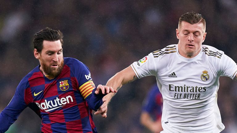 Lionel Messi in action alongside Toni Kroos