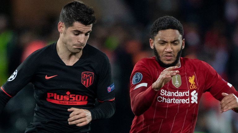 LIVERPOOL, ENGLAND - MARCH 11: Joe Gomez of Liverpool and ..lvaro Morata of Atletico Madrid during the UEFA Champions League round of 16 second leg match between Liverpool FC and Atletico Madrid at Anfield on March 11, 2020 in Liverpool, United Kingdom.  (Photo by Visionhaus)