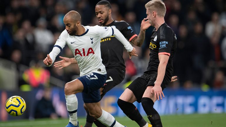 Lucas Moura of Tottenham Hotspur and Oleksandr Zinchenko and Raheem Sterling of Manchester City during the Premier League match at Tottenham Hotspur Stadium