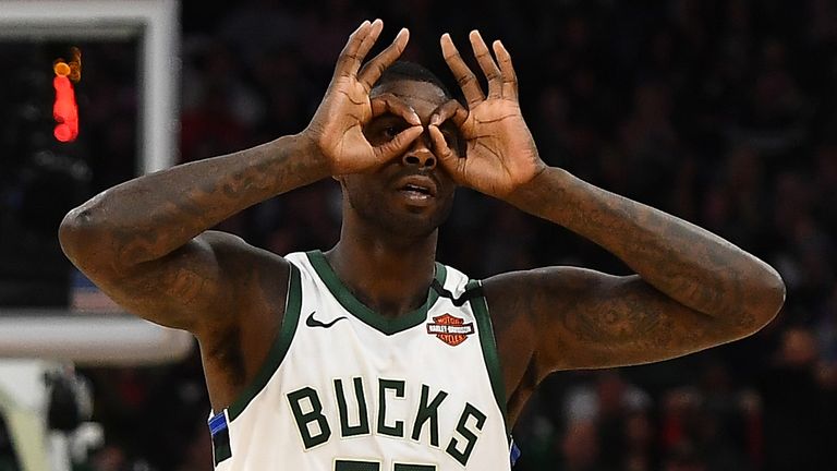 Marvin Williams celebrates after scoring a three-pointer for the Bucks