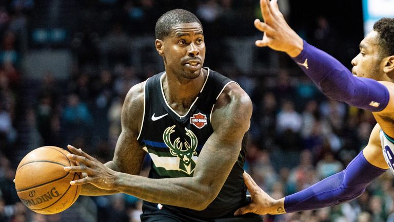 Marvin Williams prepares to pass during a Bucks game against his former team the Hornets 