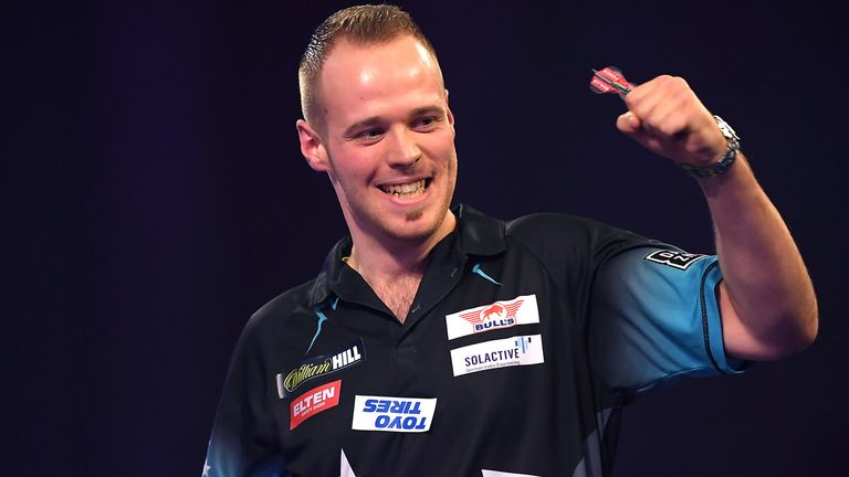 Max Hopp celebrates victory after the round 2 match between Max Hopp and Benito van de Pas on Day 8 of the 2020 William Hill World Darts Championship at Alexandra Palace on December 20, 2019 in London, England