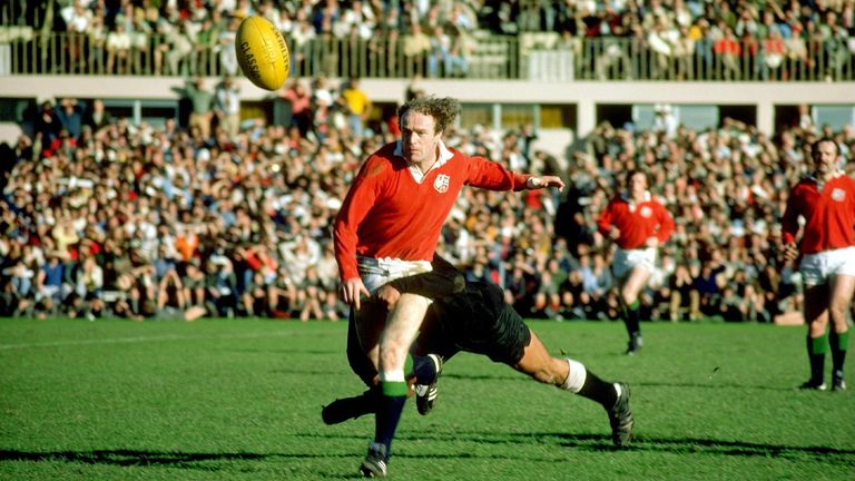 Mike Gibson  in action during the 1977 Lions  tour to New Zealand