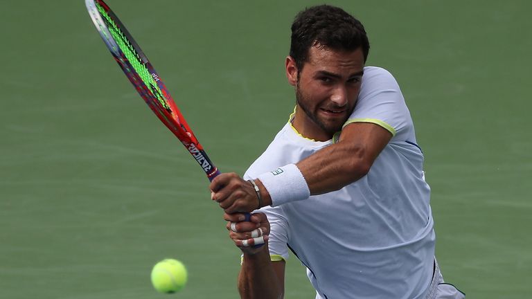 Noah Rubin returns a backhand to Thanasi Kokkinakis of Australia during the BB&T Atlanta Open at Atlantic Station on July 24, 2018 in Atlanta, Georgia