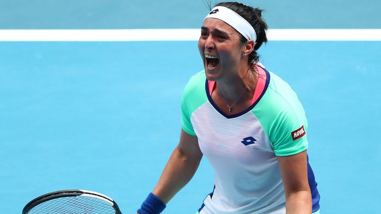 Ons Jabeur of Tunisia celebrates after winning macth point in her Women's Singles third round match against Caroline Wozniacki of Denmark on day five of the 2020 Australian Open at Melbourne Park on January 24, 2020 in Melbourne, Australia. 