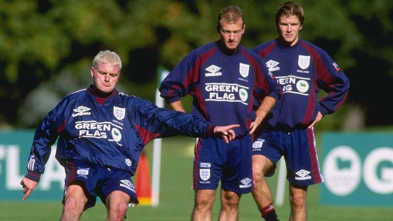 Paul Gascoigne shoots as Alan Shearer and David Beckham look on during an England training session in 1996