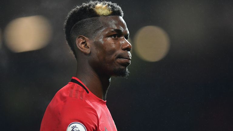 Manchester United's French midfielder Paul Pogba leaves the pitch after the English Premier League football match between Manchester United and Newcastle United at Old Trafford in Manchester, north west England, on December 26, 2019. - Manchester United won the game 4-1. 