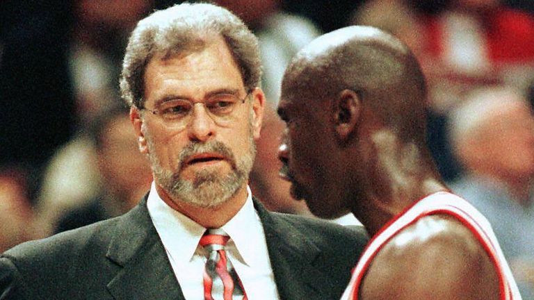 Phil Jackson shares a word with Michael Jordan in the 1997 NBA Finals