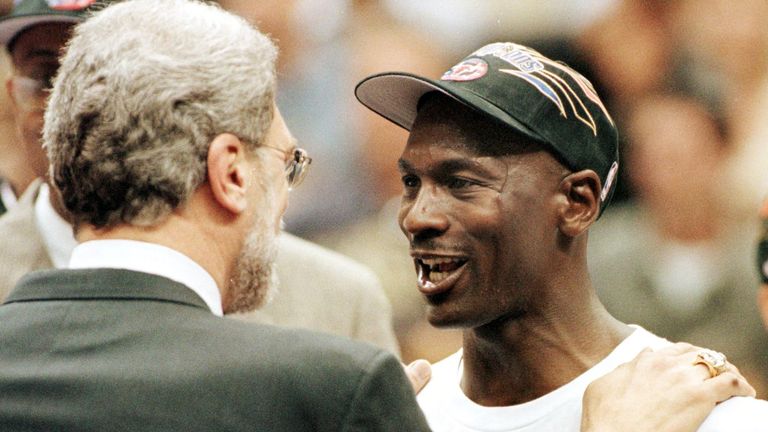 Phil Jackson and Michael Jordan celebrate the Bulls' victory in the 1998 NBA Finals