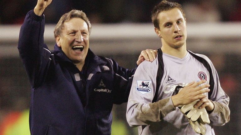 Phil Jagielka is applauded by manager Neil Warnock following his heroics in goal against Arsenal