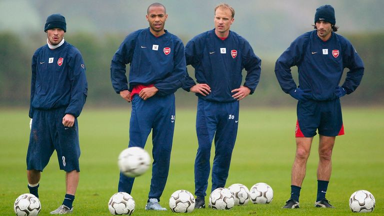 LONDON - APRIL 30:  Freddie Ljungberg (L), Thierry Henry, Dennis Bergkamp, and Robert Pires (R) line up to practise free kicks during the Arsenal Football Club training session at London Colney training ground on April 30, 2004 in London.  (Photo by Paul Gilham/Getty Images) *** Local Caption *** Freddie Ljungberg;Thierry Henry;Dennis Bergkamp;Robert Pires
