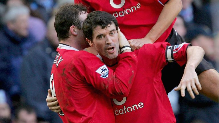 MANCHESTER, ENGLAND - FEBRUARY 13: Rio Ferdinand of Manchester United celebrates with Wayne Rooney and Roy Keane after Rooney's cross led to Richard Dunne scoring an own goal during the Barclays Premiership match between Manchester City and Manchester United at the City of Manchester stadium on February 13 2005 in Manchester, England. (Photo by John Peters/Manchester United via Getty Images) *** Local Caption *** Rio Ferdinand;Wayne Rooney;Roy Keane