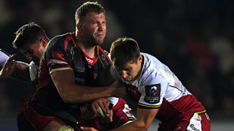 NEWPORT, WALES - OCTOBER 19: Ross Moriarty of Newport Dragons is tackled by James Grayson of Northampton Saints during the Challenge Cup match between Newport Dragons and Northampton Saints at Rodney Parade on October 19, 2018 in Newport, United Kingdom. (Photo by Stu Forster/Getty Images)