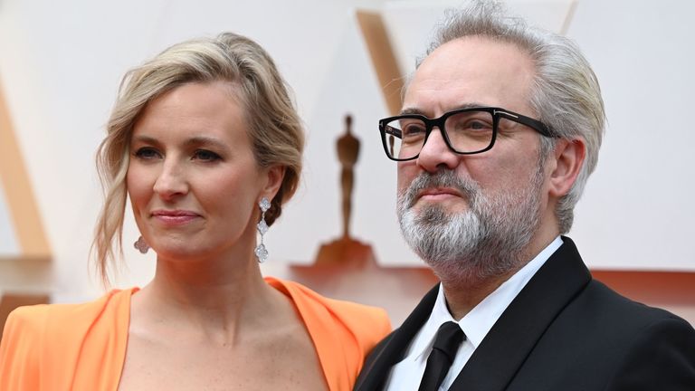 British director Sam Mendes (R) and and wife Alison Balsom arrive for the 92nd Oscars at the Dolby Theatre in Hollywood, California on February 9, 2020.
