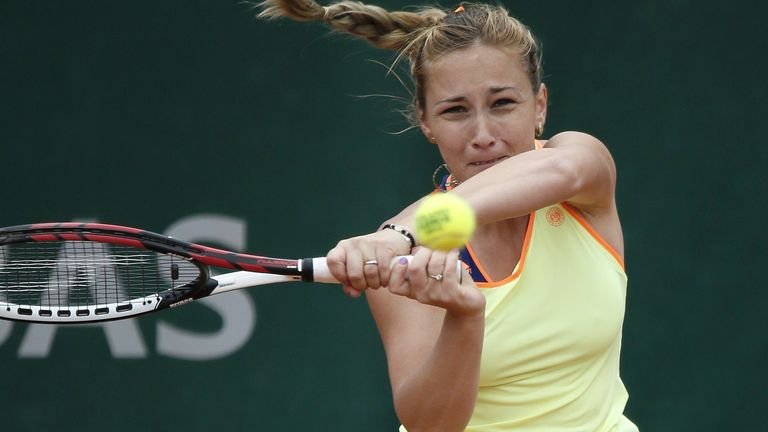 Georgia's Sofia Shapatava returns the ball to Russia's Svetlana Kuznetsova during their French tennis Open first round match at the Roland Garros stadium in Paris on May 27, 2014