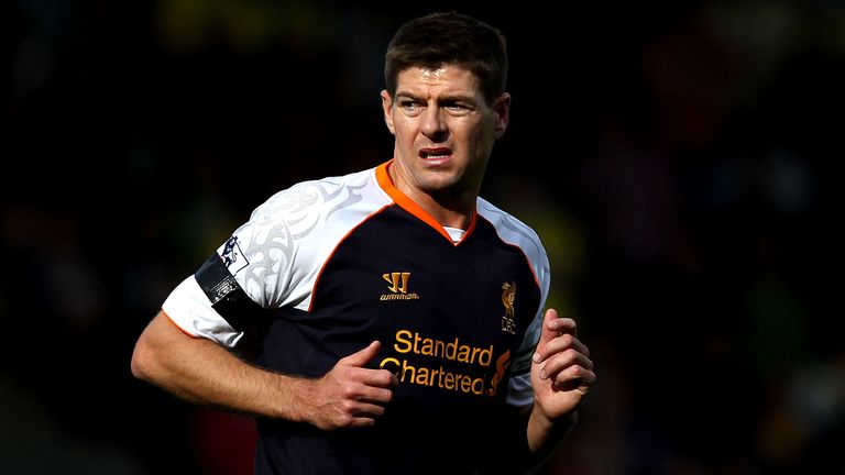 Steven Gerrard dons the purple, orange and white-sleeved Warrior strip in 2012
