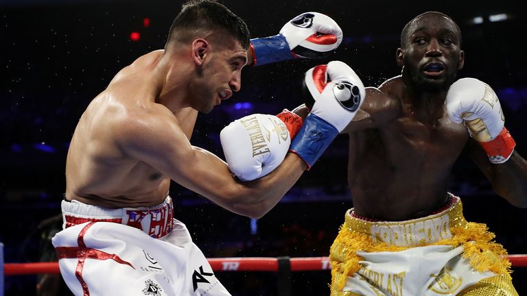 Crawford stopped Khan in their welterweight title fight
