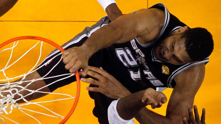Tim Duncan rams home a dunk for the Spurs against the Miami Heat in the NBA Finals