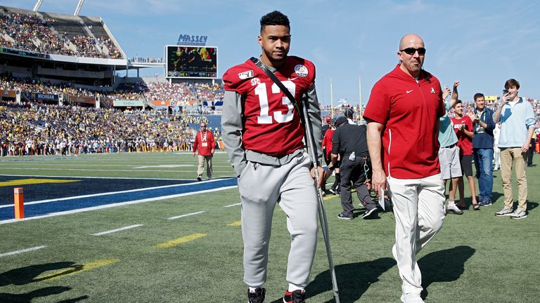 Tua Tagovailoa pictured with a crutch prior to Alabama's Vrbo Citrus Bowl win over Michigan in January
