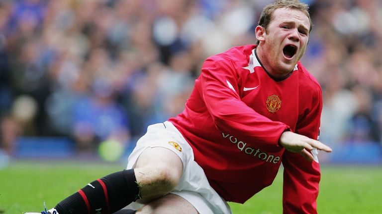 Wayne Rooney of Manchester United lies injured during the Barclays Premiership match between Chelsea and Manchester United at Stamford Bridge on April 29 2006 in London, 
