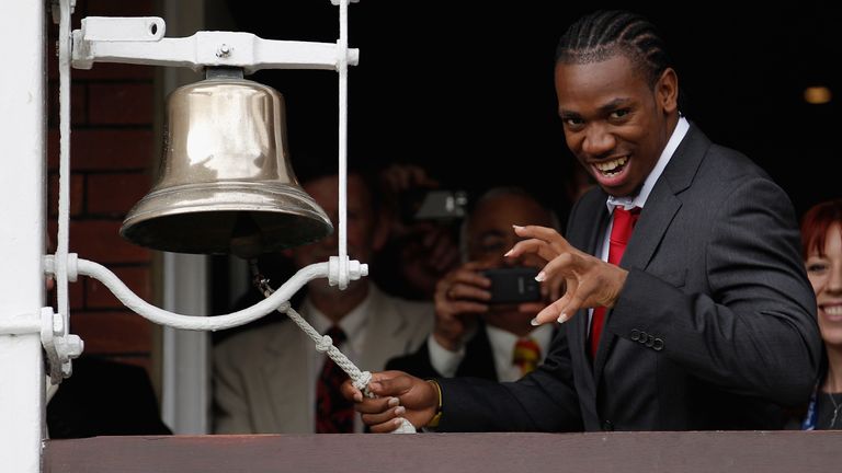 Jamaican sprinter Yohan Blake poses for photographers before ringing the bell at the start of play during day one of the 3rd Investec Test match between England and South Africa at Lord's Cricket Ground on August 16, 2012 