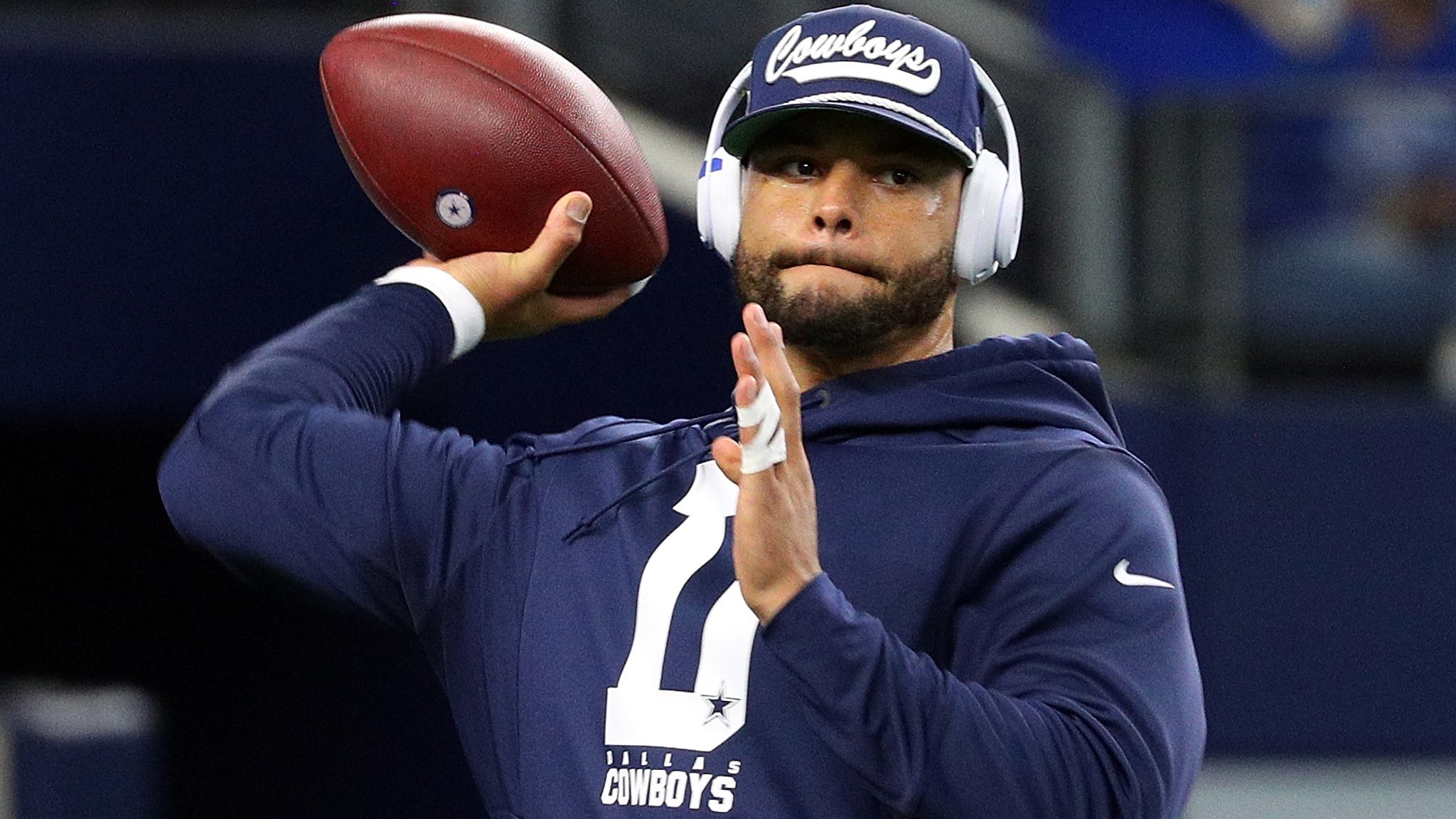 Photos: Dak Prescott connects with new QB Andy Dalton, and more on