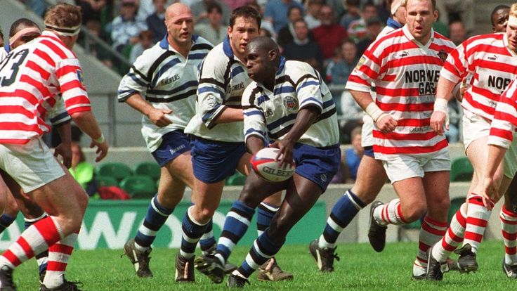 Bath's Ade Adebayo takes possession during Rugby Challenge match against Wigan, at Twickenham.